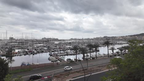 Overlooking-large-marina-port-in-Palma-de-Mallorca-with-dramatic-sky-in-the-background