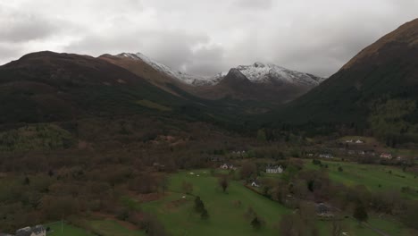 Aerial-shot-showing-the-snowy-beinn-a-bheithir-summit-in-the-Scottish-countryside