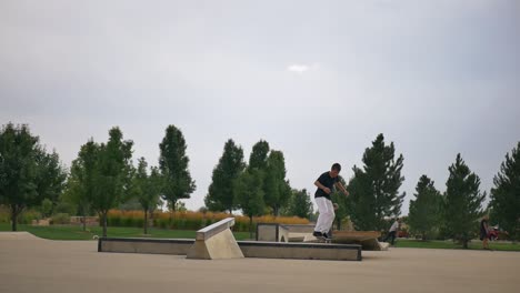 Skateboard-trick-on-the-rail-at-the-skatepark