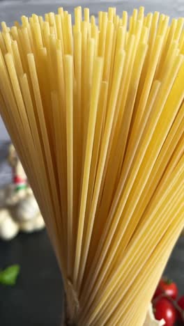 Closeup-italian-spaghetti-pasta--cooking-ingredients-spinning