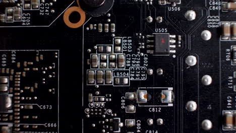 Close-up-of-a-graphics-card-PCB-highlighting-intricate-electronic-details