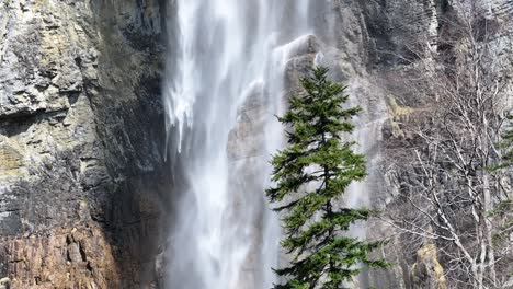 A-stunning-static-shot-captures-the-water-cascading-down-onto-the-rocks-of-the-Seerenbachfälle-waterfall,-showcasing-the-breathtaking-spectacle-of-nature