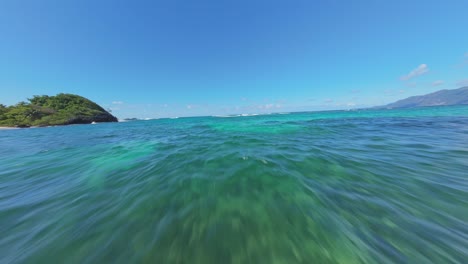 Flying-Above-The-Caribbean-Sea-Near-Playa-Ermitaño-In-Samana,-Dominican-Republic