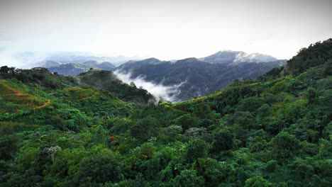 "An-aerial-view-reveals-the-hazy-mountain-landscape-of-Yauco,-Puerto-Rico