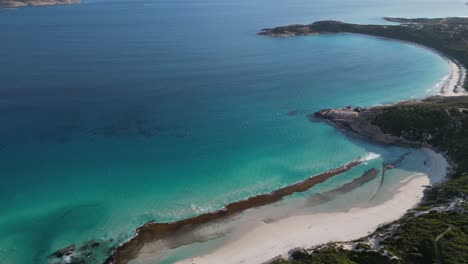 West-Beach-with-soft-sand-and-turquoise-water-bay-lighting-by-sun