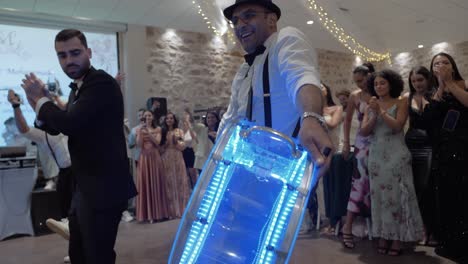 Slow-motion-shot-of-the-bride-and-groom-dancing-with-drummers-playing