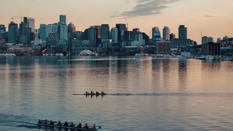 Tracking-Shot-of-Rowers-at-Sunset-on-Lake-Union-with-Reflections