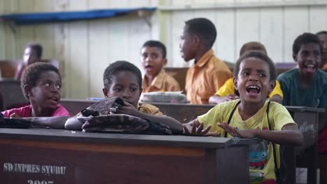 Dark-skin-colour-children-in-classroom-gymnasium-age-learning-in-school