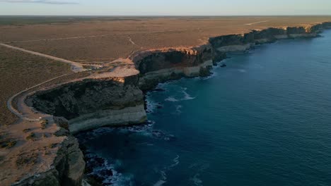 Aerial-pan-shot-of-Nullarbor-Cliffs-with-beautiful-landscape-at-backround-in-South-Australia.