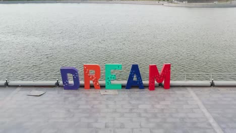 DRAM-is-visible-with-name-written-in-different-colors-on-one-side-of-the-lake