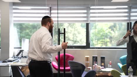 A-Jewish-businessman-entering-a-office