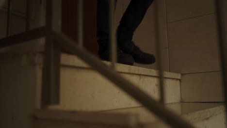 hassidic-jewish-boy-runing-down-stairs-indoors-slow-motion,-close-up