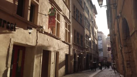 A-POV-shot-of-a-street-inside-the-old-Lyon-at-sunset