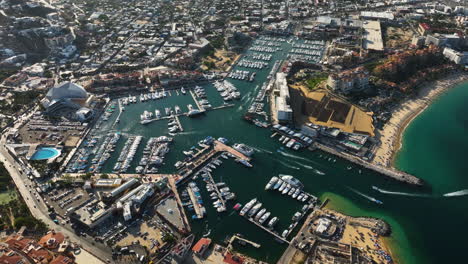 Aerial-view-overlooking-the-marina-of-Cabo-San-Lucas,-sunny-day-in-Mexico