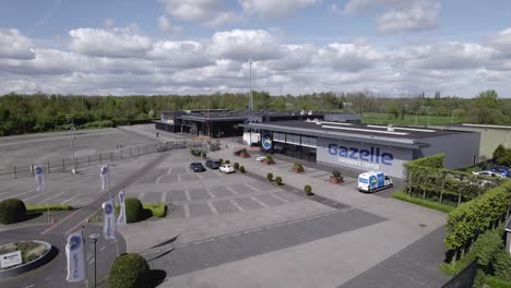 Waving-flags-of-Gazelle-experience-center-parking-lot-for-bicycle-trial-and-try-out-facility