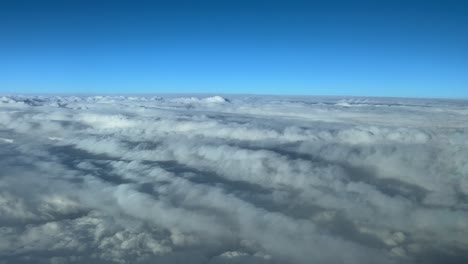 POV-flying-over-layers-of-clouds