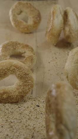 Dough-nutty-bagel-rolling-on-a-cutting-board