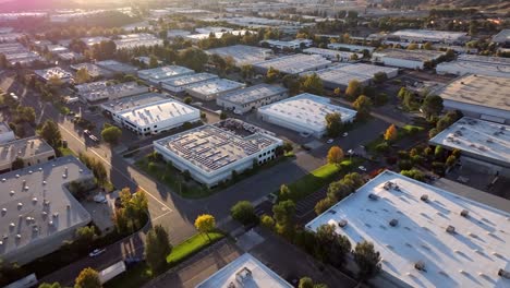 Warehouse,-business-industrial-area-of-Valencia,-California---aerial-flyover