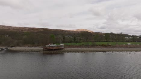 Aerial-establishing-shot-of-the-Corpach-Shipwreck-in-the-Scottish-Highlands