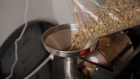 Transparent-packaging,-unroasted-green-coffee-beans,-roasting-machine