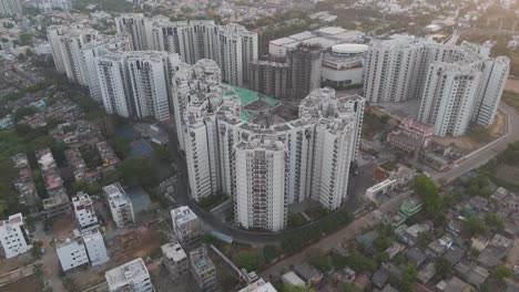 A-cinematic-drone-footage-of-Chennai,-offering-a-bird's-eye-view-of-the-city's-vibrant-streets,-towering-buildings,-and-bustling-traffic