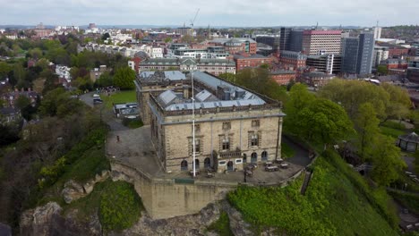 Wide-angle-drone-shot-orbiting-Nottingham-Castle-in-Midlands-in-England