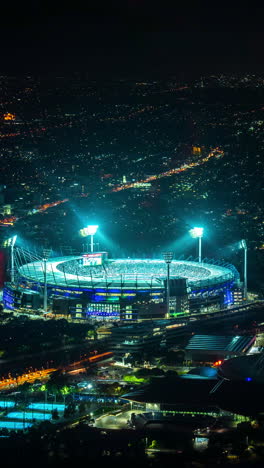 Timelapse-Vertical-De-4k,-Estadio-De-Cricket-En-Melbourne,-Australia-Durante-El-Partido-Nocturno