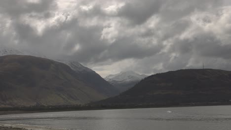 Slow-panning-shot-showing-the-snowy-north-face-on-Ben-Nevis-in-Scotland