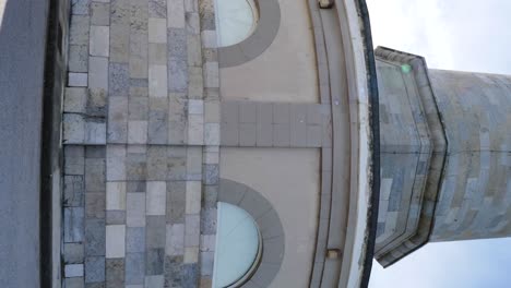 Vertical-shot-of-huge-Lighthouse-in-Spain-4K