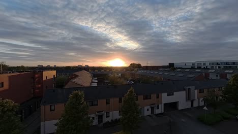 Sunrise-clouds-time-lapse-passing-over-Enfield-lock-housing-apartments-in-London-city-suburbs