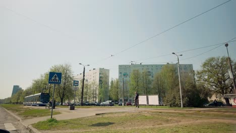 Tram-arrives-in-Imanta-Riga-residential-district-with-high-rise-aged-apartments