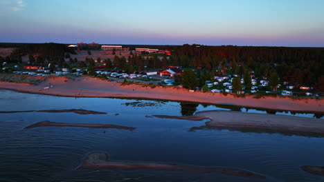 Establishing-drone-shot-of-beaches-and-the-Kalajoki-dunes,-sunset-in-Finland