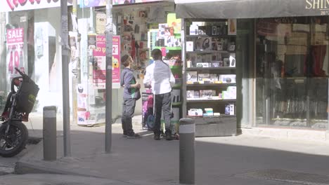 Jewish-kids-looking-at-items-outside-a-store-in-Jerusalem