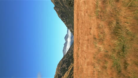 Grasslands-near-Moke-Lake-and-Closeburn-in-Queenstown-in-South-Island-New-Zealand---low-altitude-vertical-aerial-forward