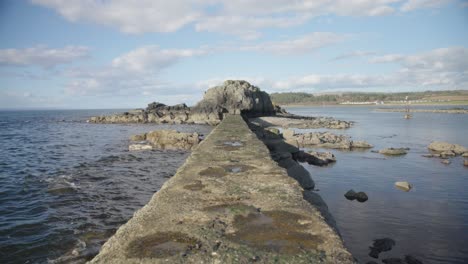 Flat-concrete-jetty-surface,-picturesque-view,-Ayrshire-coastline,-UK