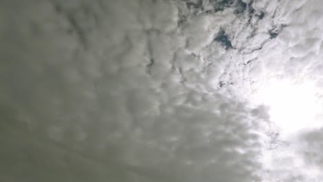 Time-lapse-of-the-sun-breaking-through-the-clouds-4k