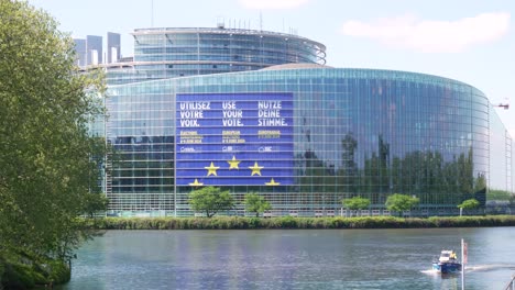 Billboard-announcing-the-European-elections-on-June-9th-2024-on-the-European-Parliament-building-in-Strasbourg,-France