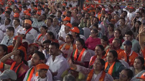 Supporters-waving-the-BJP-political-party-flag-during-Indian-Prime-Minister-Narendra-Modi-political-rally-of-Lok-Sabha-election-campaign