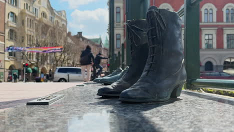 Shoes-On-Davidshall-Bridge---Way-To-Go-Sculpture-In-Malmo,-Sweden