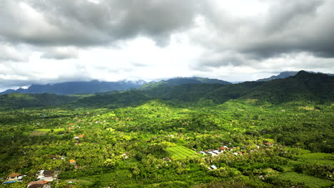 Hyperlapse-of-clouds-moving-over-Banyuwedang-Indonesian-village-in-wild-nature-of-Bali-island