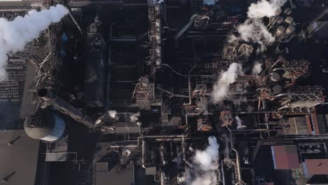 Industrial-complex-in-hamilton-with-smokestacks,-during-the-day,-aerial-view