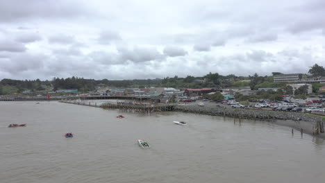 Jet-Boats-wait-for-their-turn-to-race,-Port-of-Bandon,-Oregon