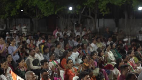 Support-waving-Shivsena-political-flag-during-Lok-Sabha-election-campaign-by-Uddhav-Thackeray-and-Sharad-Pawar-at-college-ground-in-Warje