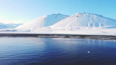 Aerial-Snaefellness-Peninsula-Iceland-sunny-day-during-a-winter-season-snow-covered-mountains-landscape