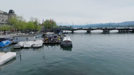 Fast-forward-moving-drone-shot-following-the-river-in-Zurich-city-centre