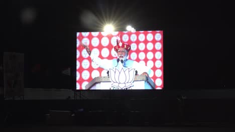 Closeup-of-Indian-Prime-Minister-Narendra-Modi-on-LED-advertisement-screen-during-the-Indian-Lok-Sabka-Election-Campaign-speech-at-Race-Course