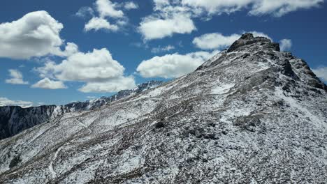 Drone-fly-up-to-reveal-another-peaks-behind-mountain