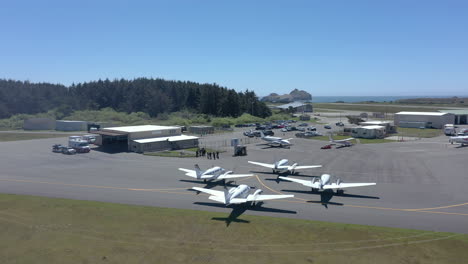 Drone-orbit-around-Cal-Ore-Life-Flight-Planes-at-Del-Norte-County-Regional-Airport-in-Crescent-City