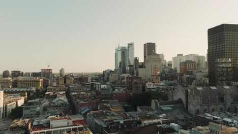 Drone-shot-of-Downtown-Montreal's-buildings