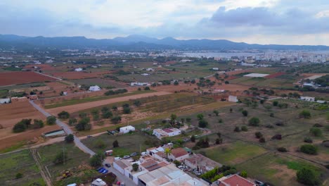 urban-rural-transition-near-the-coastline,-coastal-city